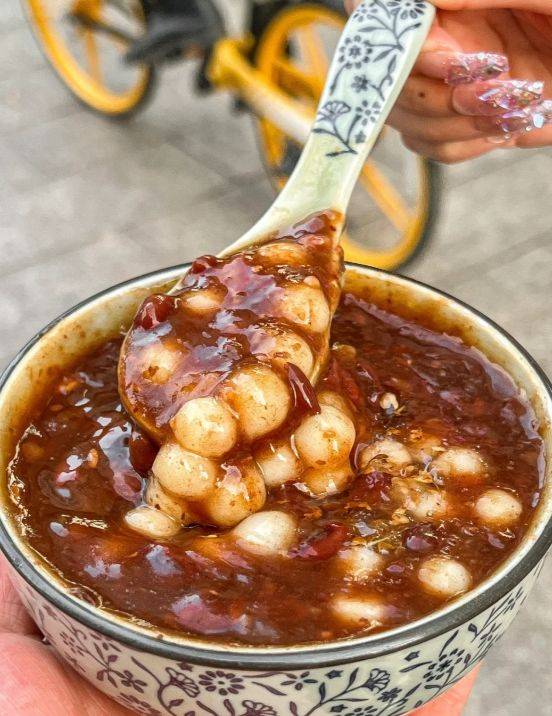 开云新闻-南京老街深処(chù)，那碗桂花糖芋苗(miáo)的温柔